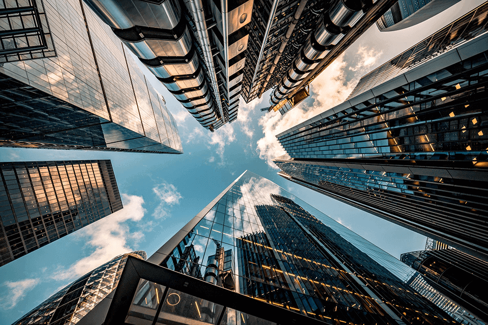 capital introduction program displayed with rising skyscraper financial buildings